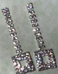 Dangling silver stone pierced earrings